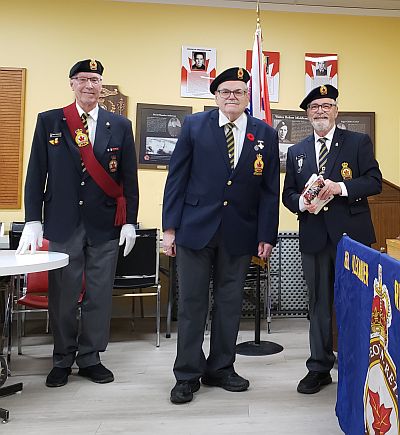 Silver Cross Mother, Bonnie Rushowick, and husband Geoff spreading ashes on their son's grave