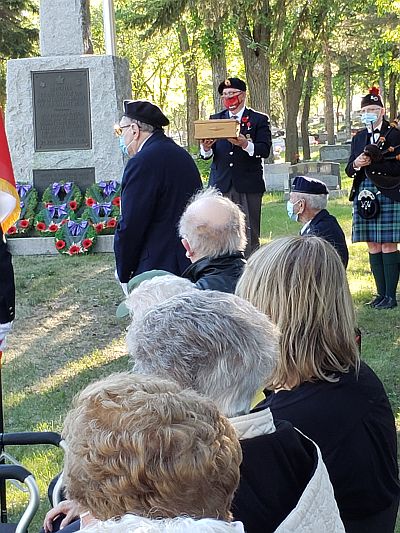 Legion President, Ken Gordon bringing the ashes