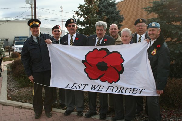 Official Flag Rasing Party at City Hall for Remembrance Day 2009 (Photo provided by the News Review)